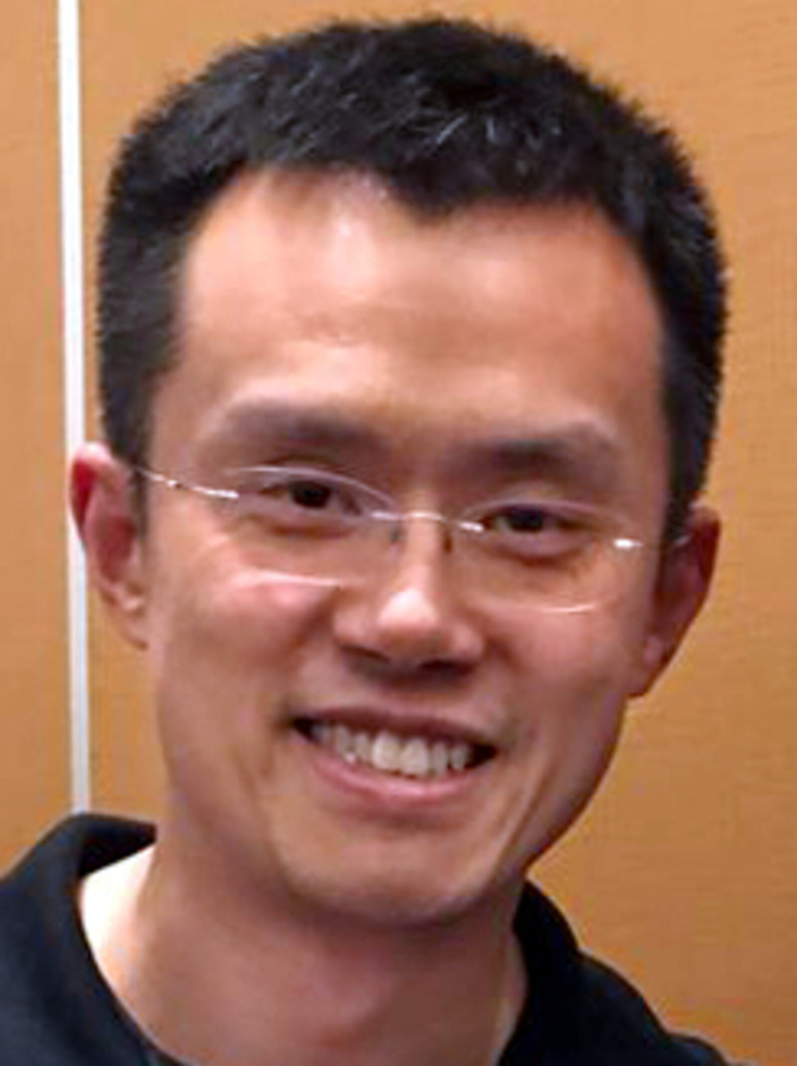 Changpeng Zhao speaking at a conference in 2018.